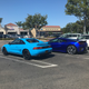 Make the mid-engine car on the left more like the mid-engine car on the right